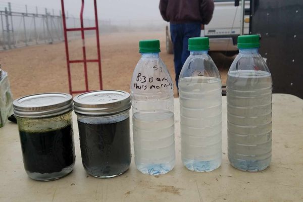 Samples of produced water before and after oil and gas water treatment