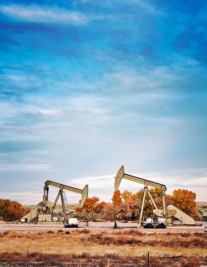 retro-toned-picture-of-two-oil-pumps
